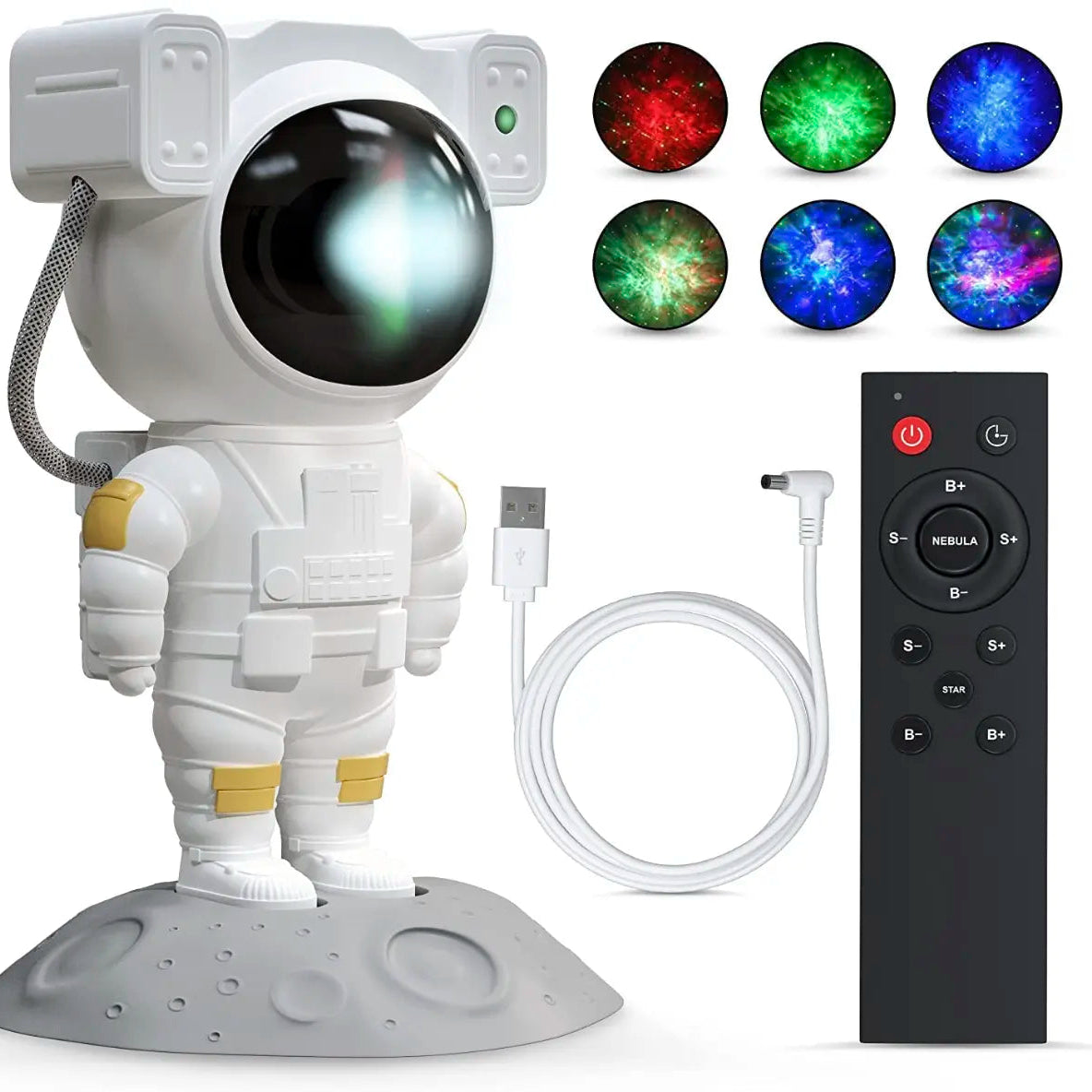 Astronaut-shaped night light projector projecting colorful lights on a ceiling, with a hand holding a remote control.