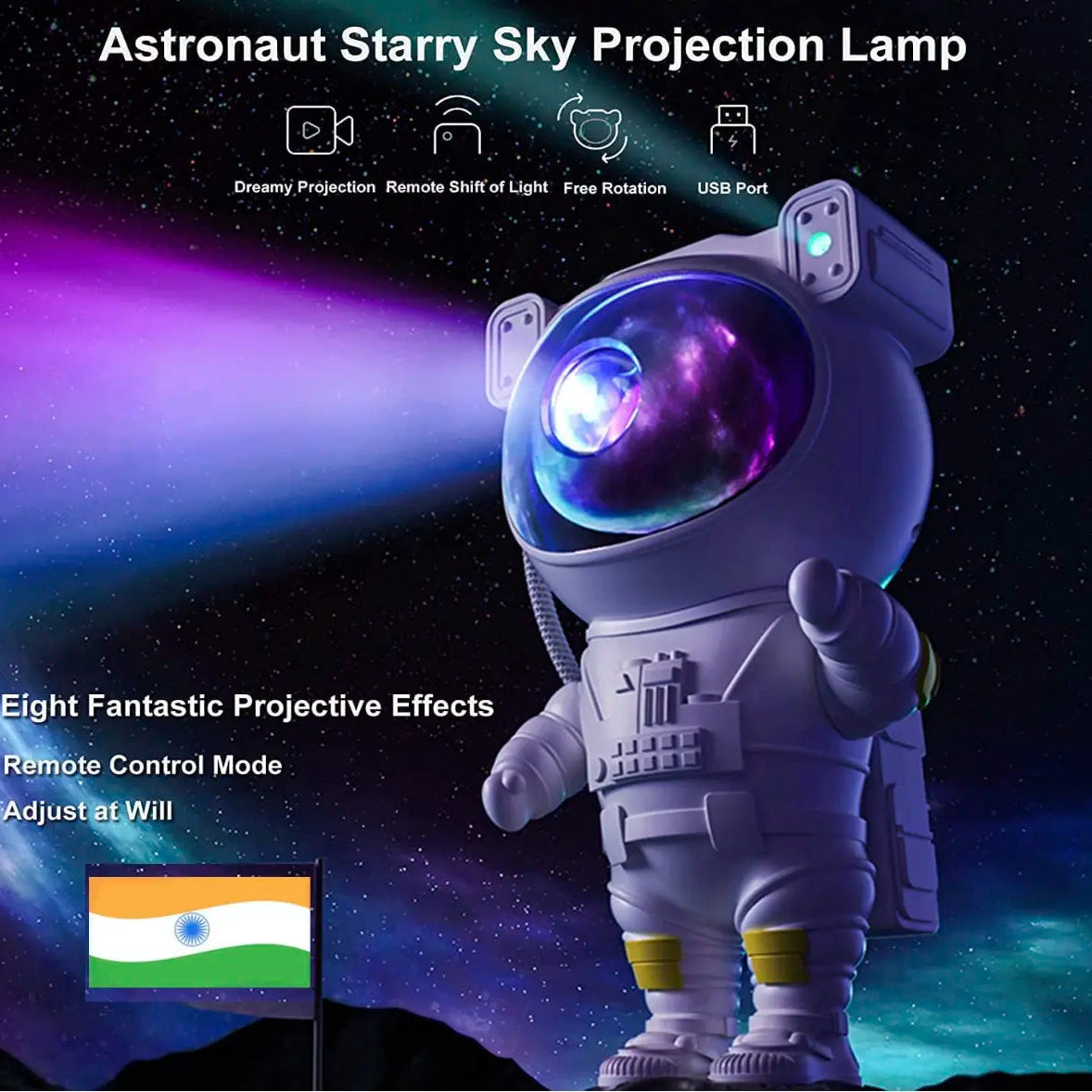 Astronaut-shaped night light projector projecting colorful lights on a ceiling, with a hand holding a remote control.